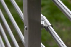 Detailed view of modern stainless railing on exterior stairs