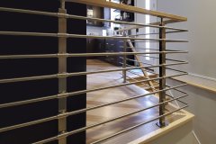 Cascadia rod railing on an interior stairwell
