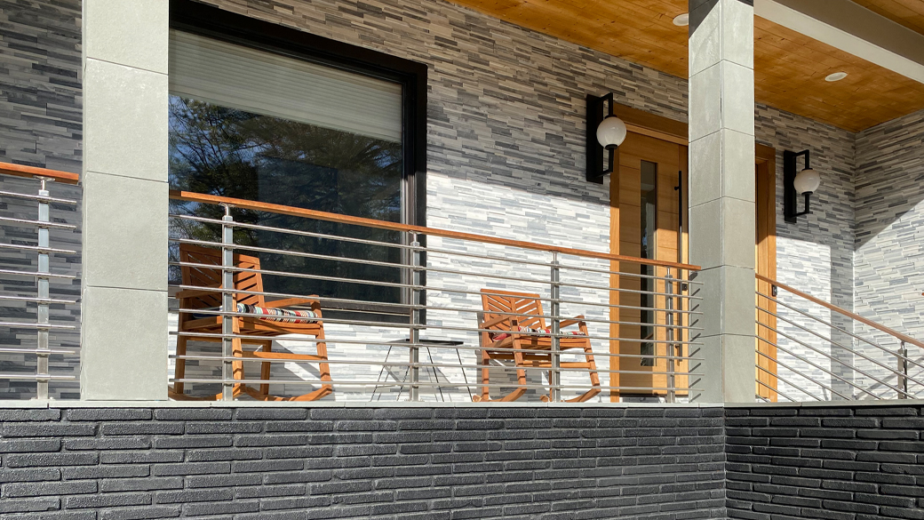The deck stair railing and porch railing kits give a very modern look to the exterior of this home. For an outdoor railing stainless steel gives a great look.